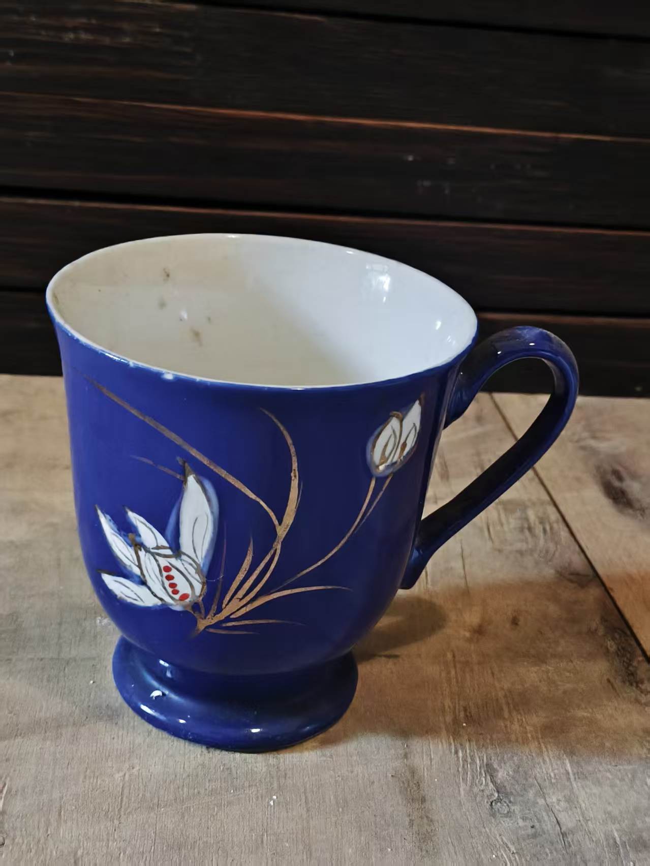 霁蓝釉描金兰花瓷茶杯